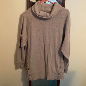 Brand new sweat shirt. Deco buttons on the front.